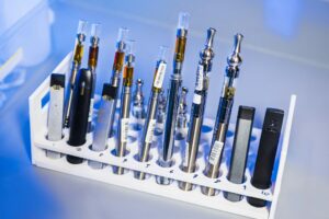 Photo of a rack of vaping devices